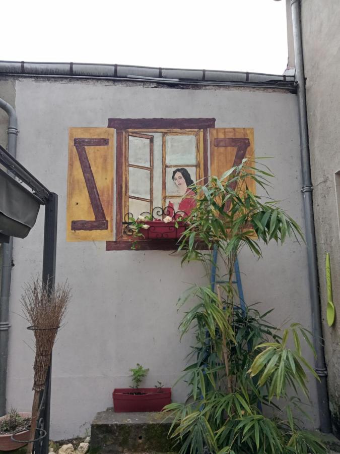 Appartement Le Labyrinthe Du Peintre Bransat Bagian luar foto